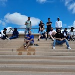 Young people sitting on stairs